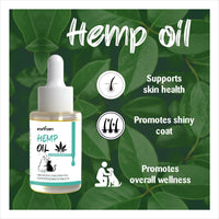 Earthzen Hemp oil bottle with benefits on a green leafy background