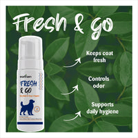 Bottle labeled 'Earthzen Fresh & Go' with green leaves in the background